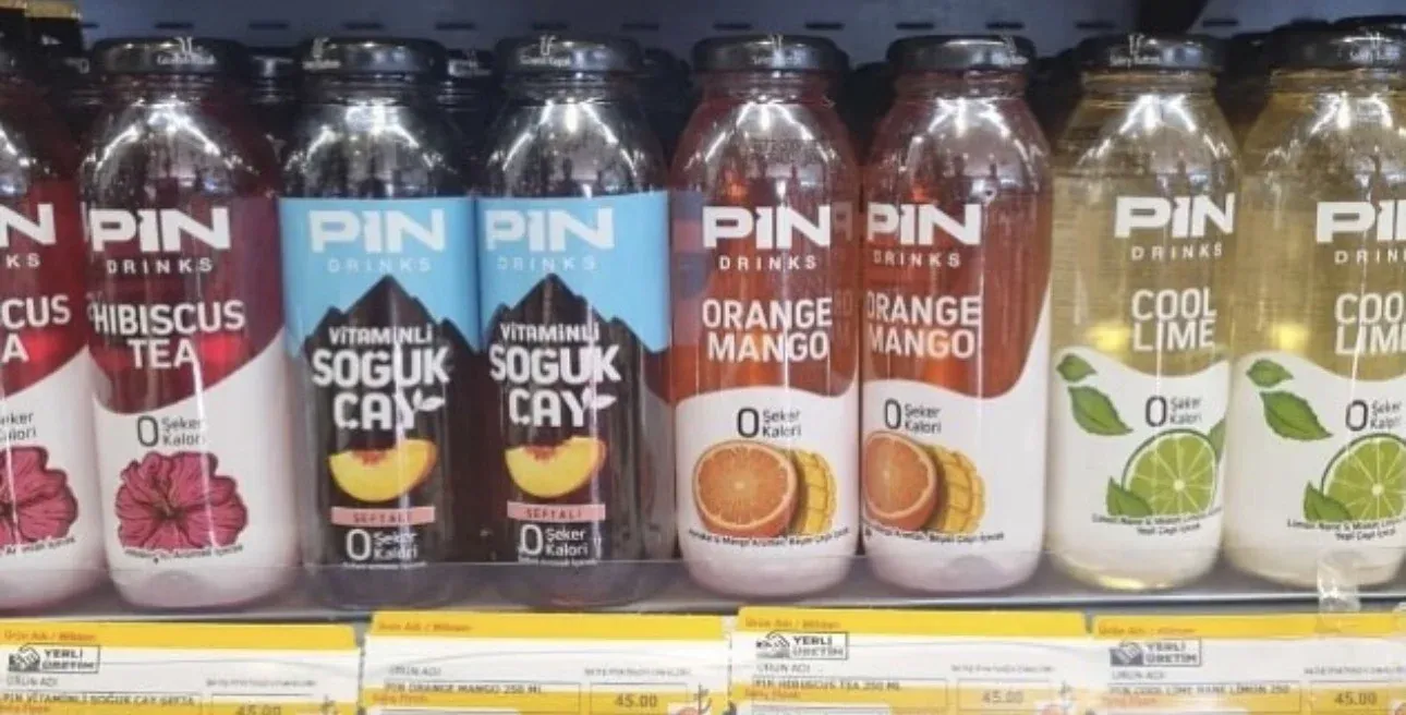 Close view of Pin Drinks packaging on shelf